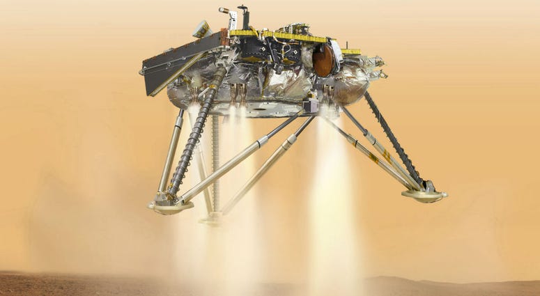 This illustration made available by NASA in October 2016 shows an illustration of NASA's InSight lander about to land on the surface of Mars. This illustration made available by NASA in October 2016 shows an illustration of NASA's InSight lander about to land on the surface of Mars.