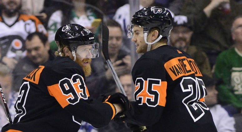 Philadelphia Flyers right wing Jakub Voracek (93) celebrates his goal with James van Riemsdyk (25) during the first period of an NHL hockey game against the Toronto Maple Leafs on Friday, March 15, 2019, in Toronto. Philadelphia Flyers right wing Jakub Voracek (93) celebrates his goal with James van Riemsdyk (25) during the first period of an NHL hockey game against the Toronto Maple Leafs on Friday, March 15, 2019, in Toronto.