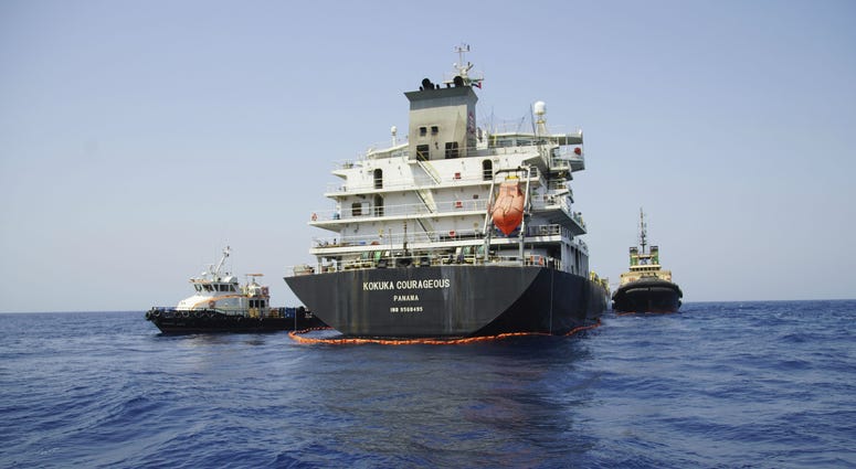 The Panama-flagged, Japanese owned oil tanker Kokuka Courageous, that the U.S. Navy says was damaged by a limpet mine, is anchored off Fujairah, United Arab Emirates, during a trip organized by the Navy for journalists, Wednesday, June 19, 2019. The Panama-flagged, Japanese owned oil tanker Kokuka Courageous, that the U.S. Navy says was damaged by a limpet mine, is anchored off Fujairah, United Arab Emirates, during a trip organized by the Navy for journalists, Wednesday, June 19, 2019.