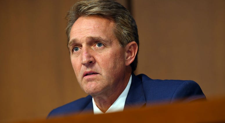 Sen. Jeff Flake, R-Ariz., listens during the hearing for Supreme Court Associate Justice Brett Kavanaugh. Sen. Jeff Flake, R-Ariz., listens during the hearing for Supreme Court Associate Justice Brett Kavanaugh.
