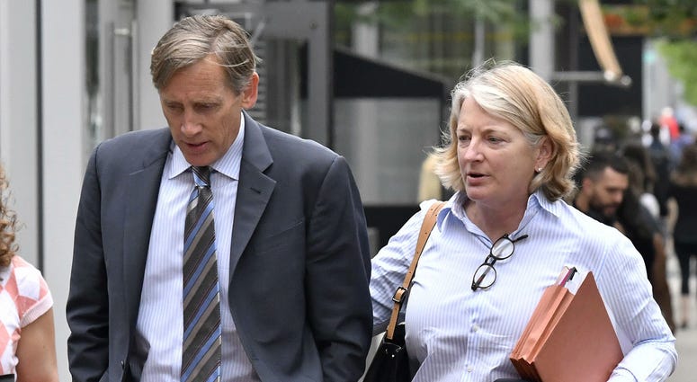Jeffrey Bizzack, left, arrives at federal court with a member of his defense team, Wednesday July 24, 2019, in Boston where he is expected to plead guilty to charges for allegedly paying to get his son into the University of Southern California. Jeffrey Bizzack, left, arrives at federal court with a member of his defense team, Wednesday July 24, 2019, in Boston where he is expected to plead guilty to charges for allegedly paying to get his son into the University of Southern California.