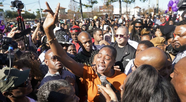 LaPorsha Washington, center, the mother of seven-year-old daughter Jazmine Barnes, who was killed on Sunday, speaks to the crowd during a community rally outside Walmart, Saturday, Jan. 5, 2019, in Houston. LaPorsha Washington, center, the mother of seven-year-old daughter Jazmine Barnes, who was killed on Sunday, speaks to the crowd during a community rally outside Walmart, Saturday, Jan. 5, 2019, in Houston.