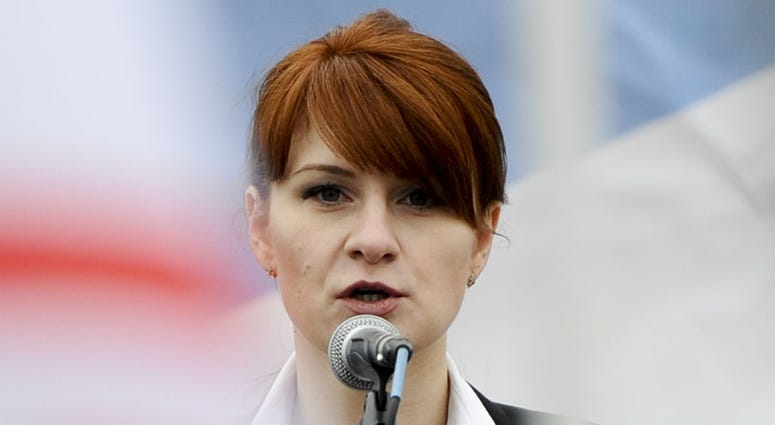In this photo taken on Sunday, April 21, 2013, Maria Butina, leader of a pro-gun organization in Russia, speaks to a crowd during a rally in support of legalizing the possession of handguns in Moscow, Russia. In this photo taken on Sunday, April 21, 2013, Maria Butina, leader of a pro-gun organization in Russia, speaks to a crowd during a rally in support of legalizing the possession of handguns in Moscow, Russia.