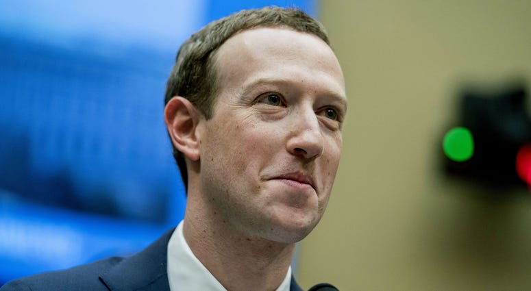 In this April 11, 2018 file photo, Facebook CEO Mark Zuckerberg pauses while testifying on Capitol Hill in Washington. Facebook CEO Mark Zuckerberg