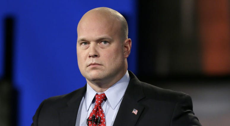 In this April 24, 2014, file photo, then-Iowa Republican senatorial candidate and former U.S. Attorney Matt Whitaker watches before a live televised debate in Johnston, Iowa. In this April 24, 2014, file photo, then-Iowa Republican senatorial candidate and former U.S. Attorney Matt Whitaker watches before a live televised debate in Johnston, Iowa.