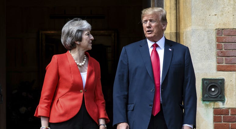 British Prime Minister Theresa May greets U.S President Donald Trump before their meeting at Chequers, in Buckinghamshire, England, Friday, July 13, 2018. British Prime Minister Theresa May greets U.S President Donald Trump before their meeting at Chequers, in Buckinghamshire, England, Friday, July 13, 2018.