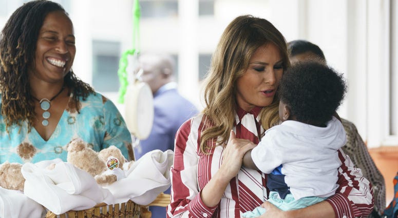 First lady Melania Trump holds a baby as she visits Greater Accra Regional Hospital in Accra, Ghana, Tuesday, Oct. 2, 2018. First lady Melania Trump holds a baby as she visits Greater Accra Regional Hospital in Accra, Ghana, Tuesday, Oct. 2, 2018.