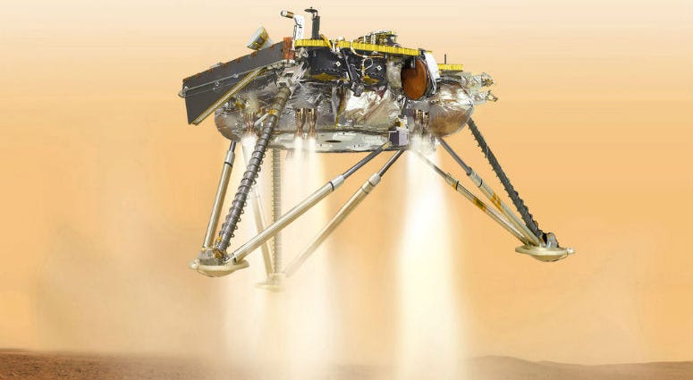 This illustration made available by NASA in October 2016 shows an illustration of NASA's InSight lander about to land on the surface of Mars.