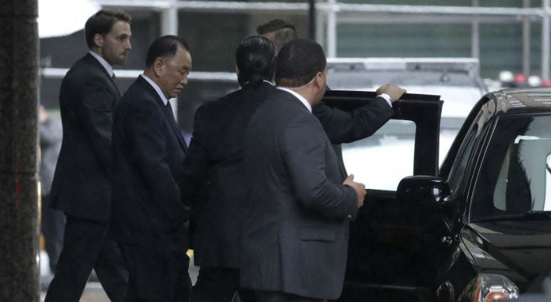 Kim Yong Chol, second from left, North Korea's former military intelligence chief and a close aid to leader Kim Jong Un, walks out of a building after meeting with U.S. Secretary of State Mike Pompeo, Thursday, May 31, 2018, in New York. Kim Yong Chol walks out of a building after meeting with U.S. Secretary of State Mike Pompeo