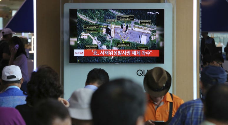 A TV screen shows a satellite image of North Korea's Sohae launch site, during a news program at the Seoul Railway Station in Seoul, South Korea, Tuesday, July 24, 2018. A TV screen shows a satellite image of North Korea's Sohae launch site, during a news program at the Seoul Railway Station in Seoul, South Korea, Tuesday, July 24, 2018.