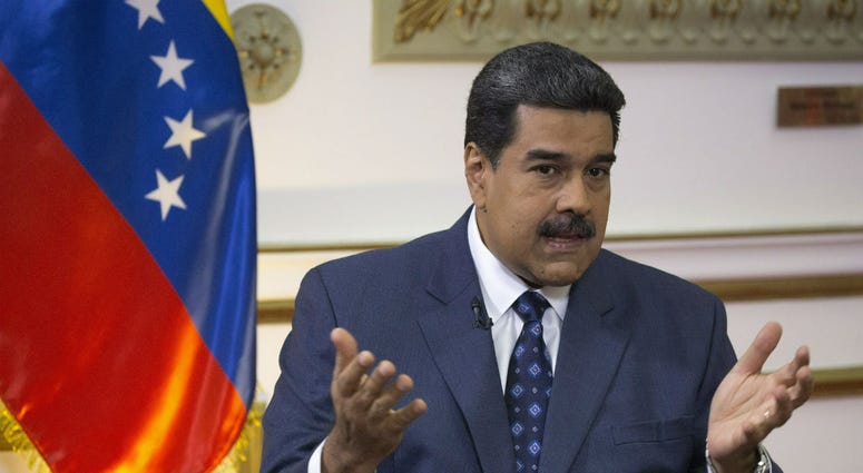 Venezuela's President Nicolas Maduro speaks during an interview with The Associated Press at Miraflores presidential palace in Caracas, Venezuela, Thursday, Feb. 14, 2019. Venezuela's President Nicolas Maduro speaks during an interview with The Associated Press at Miraflores presidential palace in Caracas, Venezuela, Thursday, Feb. 14, 2019.
