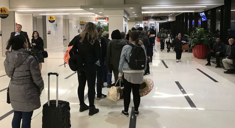 At some points, the TSA checkpoint line at Terminal D/E at Philadelphia International Airport was similar to the one the day before Thanksgiving. At some points, the TSA checkpoint line at Terminal D/E at Philadelphia International Airport was similar to the one the day before Thanksgiving.
