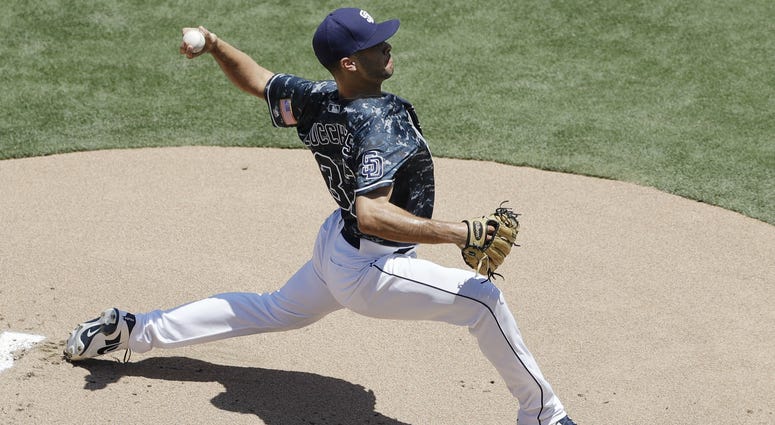 San Diego Padres starting pitcher Joey Lucchesi works against a Philadelphia Phillies batter during the first inning of a baseball game Sunday, Aug. 12, 2018, in San Diego. San Diego Padres starting pitcher Joey Lucchesi works against a Philadelphia Phillies batter during the first inning of a baseball game Sunday, Aug. 12, 2018, in San Diego.