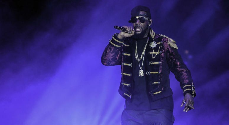 R. Kelly performs at the American Airlines Arena. R. Kelly performs at the American Airlines Arena.