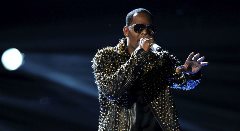In this June 30, 2013, file photo, R. Kelly performs onstage at the BET Awards at the Nokia Theatre in Los Angeles. R. Kelly