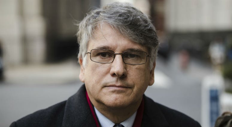 In this Nov. 21, 2017, file photo, neurologist Dr. Ricardo Cruciani walks from the center for criminal justice after pleading guilty to misdemeanor charges that he groped women at a clinic in Philadelphia. Ricardo Cruciani