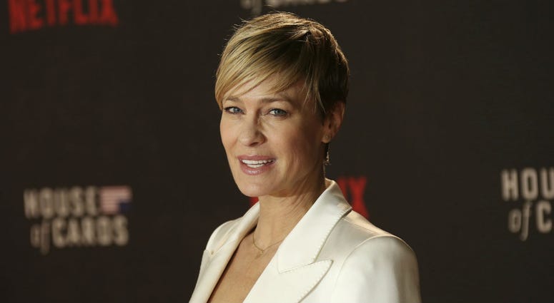 In this Feb. 26, 2015, file photo, Actress Robin Wright poses for photographers upon arrival at the House Of Cards season 3 World Premiere at the Empire Cinema in central London. In this Feb. 26, 2015, file photo, Actress Robin Wright poses for photographers upon arrival at the House Of Cards season 3 World Premiere at the Empire Cinema in central London.