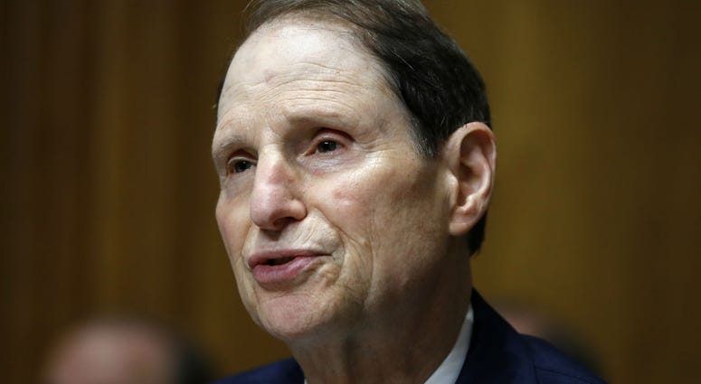 In this June 28, 2018, file photo, Sen. Ron Wyden, D-Ore., ranking member of the Senate Finance Committee, speaks during a hearing on the nomination of Charles Rettig for Internal Revenue Service Commissioner on Capitol Hill in Washington. In this June 28, 2018, file photo, Sen. Ron Wyden, D-Ore., ranking member of the Senate Finance Committee, speaks during a hearing on the nomination of Charles Rettig for Internal Revenue Service Commissioner on Capitol Hill in Washington.