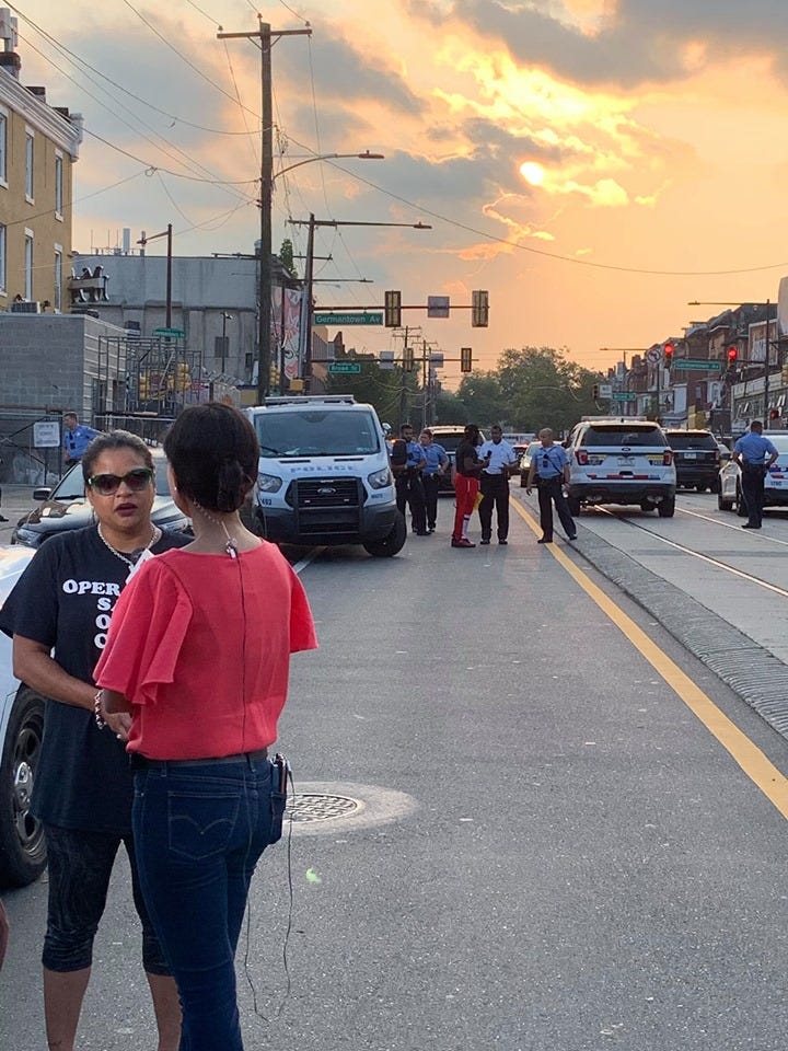 Rosalind Pichardo at the scene of the shooting near Broad St. and Erie Ave. Wednesday evening.