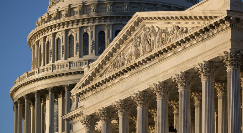 In this Jan. 25, 2017, file photo, the Capitol in Washington at sunrise. The coming battle over a Supreme Court nominee promises to be a bruising one. Capitol in Washington at sunrise