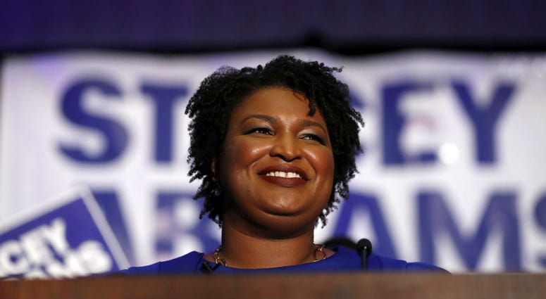 Democratic candidate for Georgia Governor Stacey Abrams smiles as she speaks during an election-night watch party Tuesday, May 22, 2018, in Atlanta. Democratic candidate for Georgia Governor Stacey Abrams