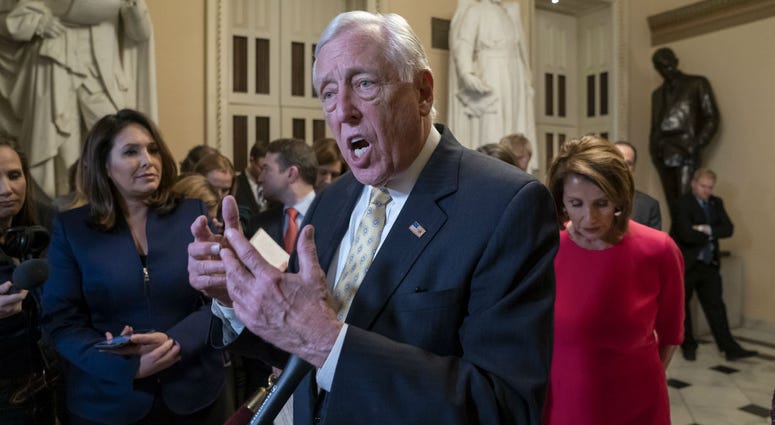 House Majority Leader Steny Hoyer, D-Md., center, and Speaker of the House Nancy Pelosi, D-Calif., push back on President Donald Trump's demand for funding to build a wall on the US-Mexico border. House Majority Leader Steny Hoyer, D-Md., center, and Speaker of the House Nancy Pelosi, D-Calif., push back on President Donald Trump's demand for funding to build a wall on the US-Mexico border.