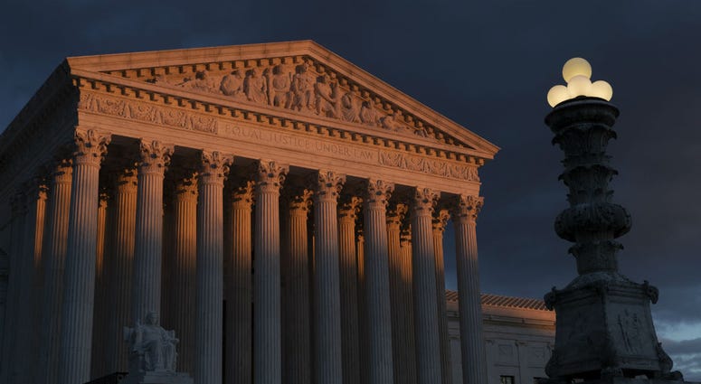 In this Jan. 24, 2019, file photo, the Supreme Court is seen at sunset in Washington. In this Jan. 24, 2019, file photo, the Supreme Court is seen at sunset in Washington.