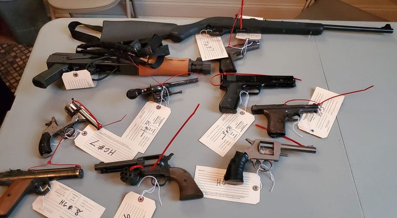 Guns collected at Taylor Memorial Baptist Church as part of a giveback event. Guns collected at Taylor Memorial Baptist Church as part of a giveback event.