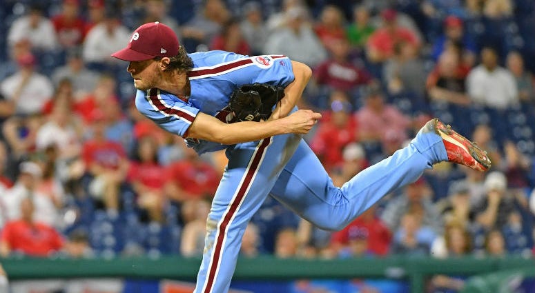 Philadelphia Phillies starting pitcher Aaron Nola (27) follows through on a pitch during the eighth inning against the Washington Nationals at Citizens Bank Park. Philadelphia Phillies starting pitcher Aaron Nola (27) follows through on a pitch during the eighth inning against the Washington Nationals at Citizens Bank Park.