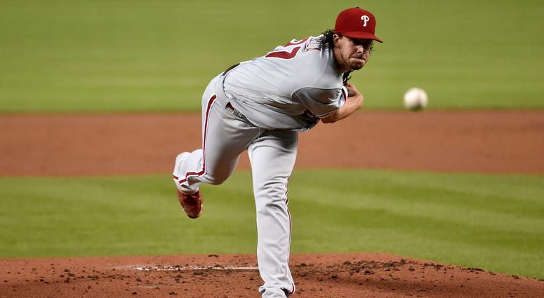 Philadelphia Phillies starting pitcher Aaron Nola (27) delivers a pitch in the first inning against the Miami Marlins at Marlins Park. Philadelphia Phillies starting pitcher Aaron Nola (27) delivers a pitch in the first inning against the Miami Marlins at Marlins Park.