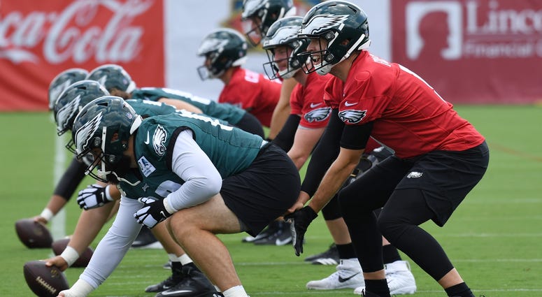 Philadelphia Eagles quarterback Carson Wentz (11) and quarterback Nick Foles (9) during training camp at NovaCare Complex. Philadelphia Eagles training camp