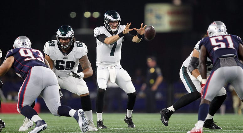Philadelphia Eagles quarterback Nate Sudfeld (7) receives the snap during the second quarter against the New England Patriots at Gillette Stadium on Aug. 16, 2018. Philadelphia Eagles quarterback Nate Sudfeld (7) receives the snap during the second quarter against the New England Patriots at Gillette Stadium on Aug. 16, 2018.