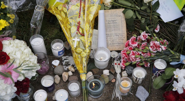 A memorial on the sidewalk on Wilkins Avenue near the Tree of Life Synagogue. A memorial on the sidewalk on Wilkins Avenue near the Tree of Life Synagogue.