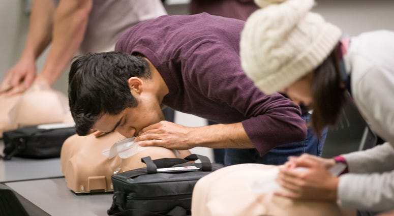 UI grad student Parth Kotak practices CPR breaths into a practice dummy at the UI Campus Recreation & Wellness Center on Monday, October 29, 2018. Students practice CPR