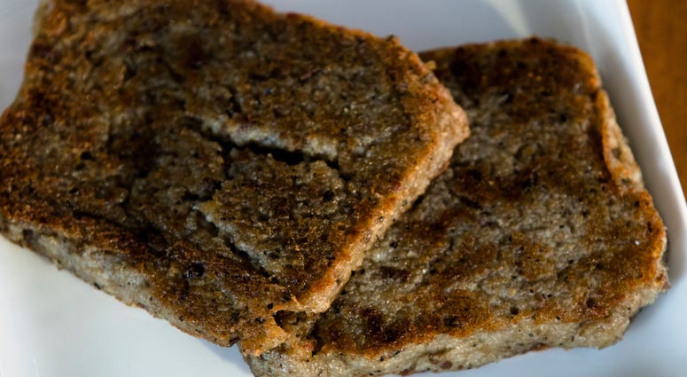 Jones Country Style Scrapple cooked by Polly Campbell for comparison with Goetta on Tuesday, Dec. 18, 2018, in Cincinnati. Scrapple