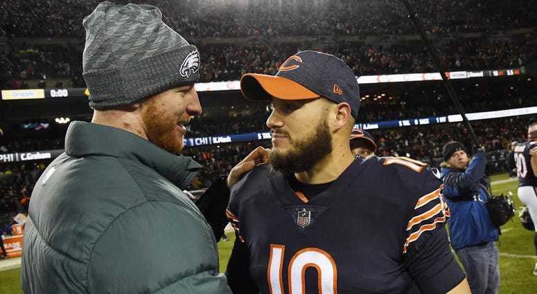 Chicago Bears quarterback Mitchell Trubisky (10) greets Philadelphia Eagles quarterback Carson Wentz (left) after a NFC Wild Card playoff football game at Soldier Field. Chicago Bears quarterback Mitchell Trubisky (10) greets Philadelphia Eagles quarterback Carson Wentz (left) after a NFC Wild Card playoff football game at Soldier Field.