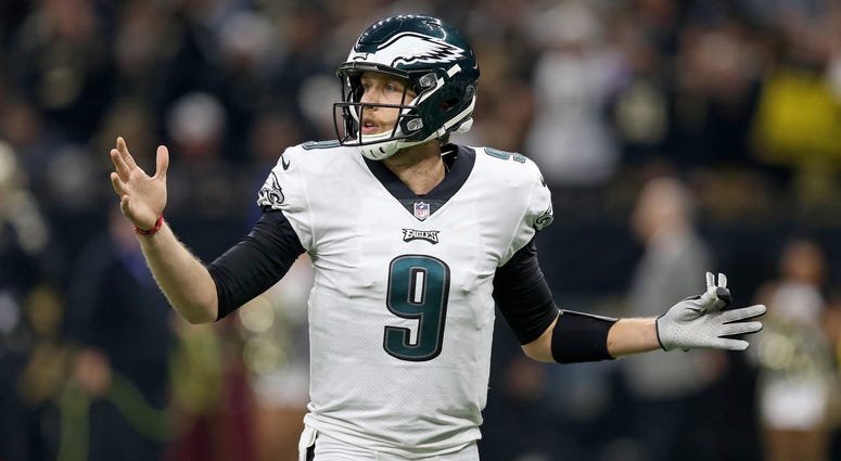 Philadelphia Eagles quarterback Nick Foles (9) gestures during the first quarter of a NFC Divisional playoff football game against the New Orleans Saints at Mercedes-Benz Superdome, Jan. 13, 2019. Philadelphia Eagles quarterback Nick Foles