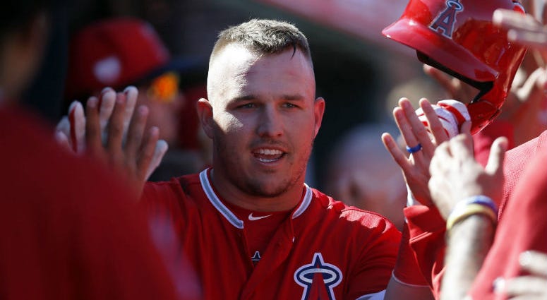 Mar 5, 2019; Tempe, AZ, USA; Los Angeles Angels center fielder Mike Trout (27) celebrates after hitting a two run home run in the third inning during a spring training game against the Chicago Cubs at Tempe Diablo Stadium. Los Angeles Angels center fielder Mike Trout (27) celebrates after hitting a two run home run in the third inning during a spring training game against the Chicago Cubs at Tempe Diablo Stadium.