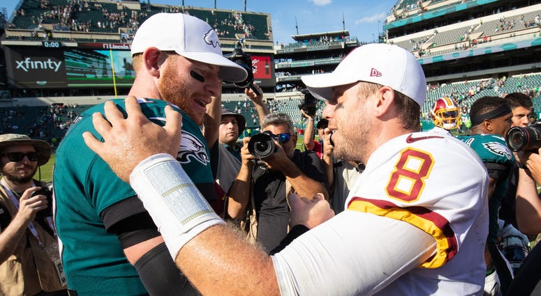 Philadelphia Eagles quarterback Carson Wentz (11) and Washington Redskins quarterback Case Keenum (8) shake hands on the field after the game at Lincoln Financial Field. Philadelphia Eagles quarterback Carson Wentz (11) and Washington Redskins quarterback Case Keenum (8) shake hands on the field after the game at Lincoln Financial Field.