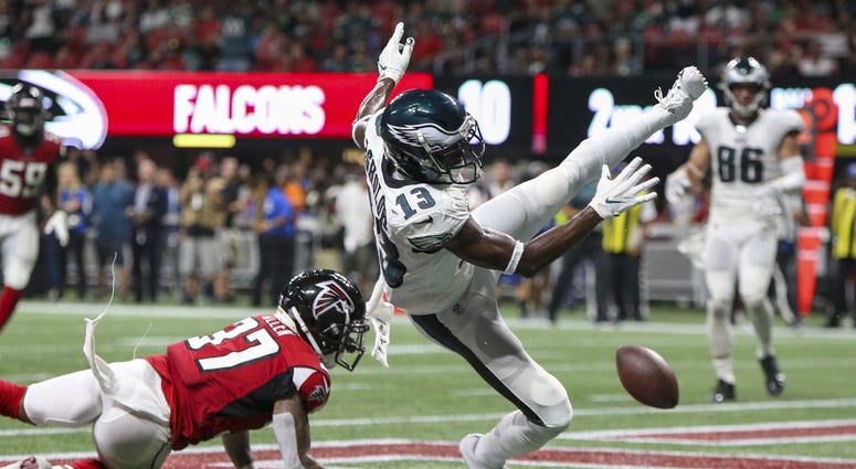 Philadelphia Eagles wide receiver Nelson Agholor (13) has a catch broken up by Atlanta Falcons free safety Ricardo Allen (37) in the second quarter at Mercedes-Benz Stadium. Philadelphia Eagles wide receiver Nelson Agholor (13) has a catch broken up by Atlanta Falcons free safety Ricardo Allen (37) in the second quarter at Mercedes-Benz Stadium.