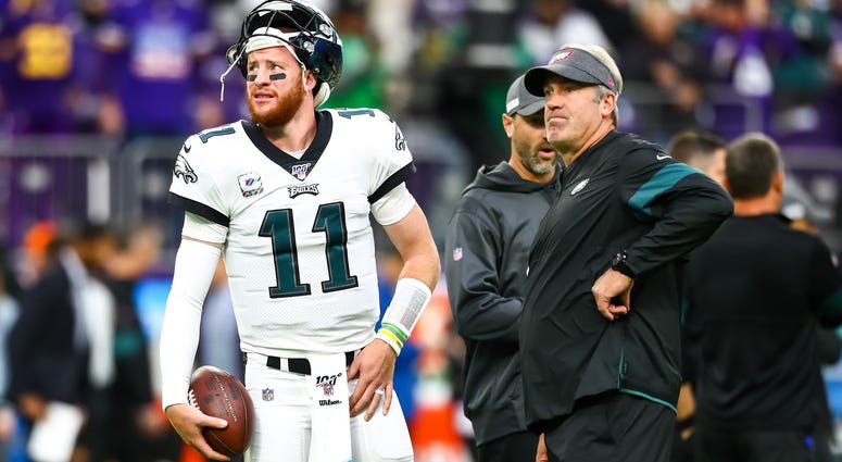 Philadelphia Eagles quarterback Carson Wentz and head coach Doug Pederson talk before the start of a game against the Minnesota Vikings at U.S. Bank Stadium. Philadelphia Eagles quarterback Carson Wentz and head coach Doug Pederson talk before the start of a game against the Minnesota Vikings at U.S. Bank Stadium.