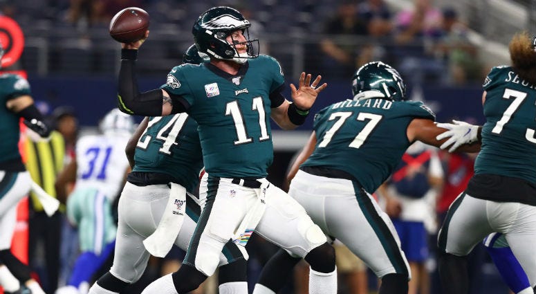 Oct 20, 2019; Arlington, TX, USA; Philadelphia Eagles quarterback Carson Wentz (11) throws in the pocket in the third quarter against the Dallas Cowboys at AT&T Stadium. Philadelphia Eagles quarterback Carson Wentz (11) throws in the pocket in the third quarter against the Dallas Cowboys at AT&T Stadium.