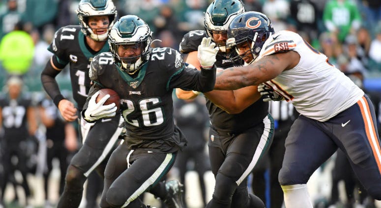 Philadelphia Eagles running back Jordan Howard (24) runs past Chicago Bears nose tackle Eddie Goldman (91) during the fourth quarter at Lincoln Financial Field. Philadelphia Eagles running back Jordan Howard (24) runs past Chicago Bears nose tackle Eddie Goldman (91) during the fourth quarter at Lincoln Financial Field.