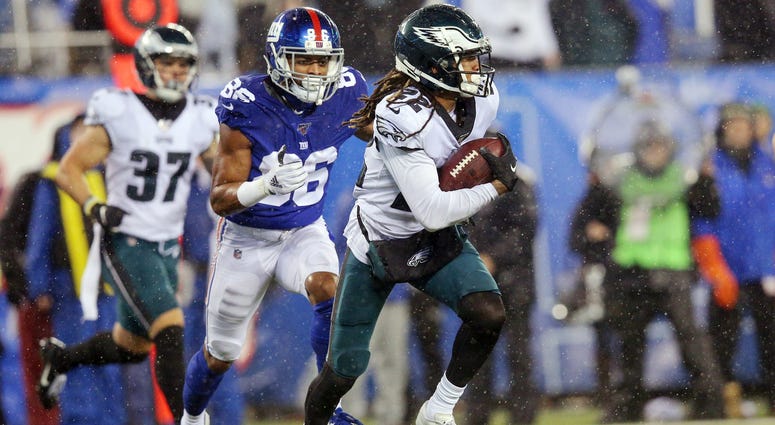 Philadelphia Eagles cornerback Sidney Jones (22) runs back an interception against New York Giants wide receiver Darius Slayton (86) during the fourth quarter at MetLife Stadium. Philadelphia Eagles cornerback Sidney Jones (22) runs back an interception against New York Giants wide receiver Darius Slayton (86) during the fourth quarter at MetLife Stadium.