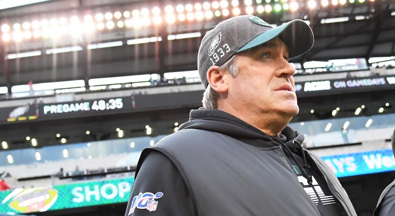 Philadelphia Eagles Doug Pederson walks out for pregame warmups before the start of the NFC Wild Card playoff football game against the Seattle Seahawks at Lincoln Financial Field, Jan. 5, 2020. Doug Pederson