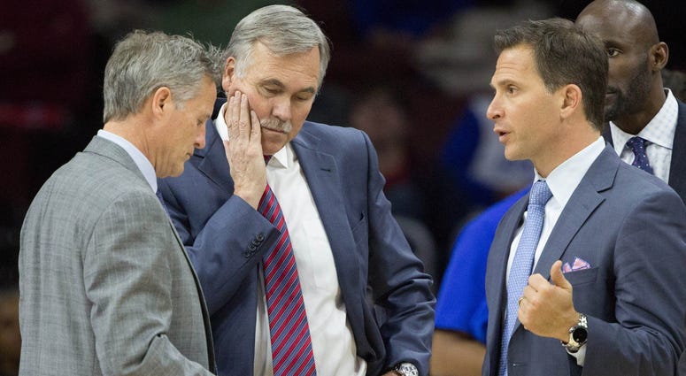 Philadelphia 76ers head coach Brett Brown (left), associate head coach Mike D'Antoni (center) and assistant coach Billy Lange (right) during a timeout at Wells Fargo Center, Jan. 4, 2016. Brett Brown, Mike D'Antoni, Billy Lange