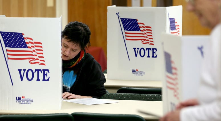 Amber McAlister votes during the New York presidential primary election at the Lutheran Church on Winton Road. Amber McAlister votes during the New York presidential primary election at the Lutheran Church on Winton Road.