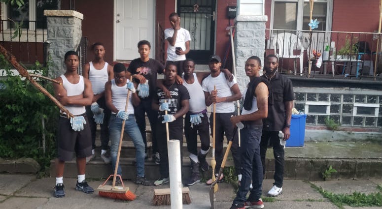 This photo shows the volunteers in the July 8 clean up day. Two of the boys were shot the next day. On Friday, men will gather in West Philadelphia for a march aimed at engaging youth to stop the violence. The effort is in response to multiple shootings in recent weeks.
