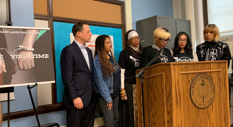 Pennsylvania Attorney General Josh Shapiro, left, stands with members of Mothers In Charge to announce the launch of Operation LIPSTICK's campaign at Dobbins Technical High School in North Philadelphia, Nov. 19, 2019. Operation LIPSTICK
