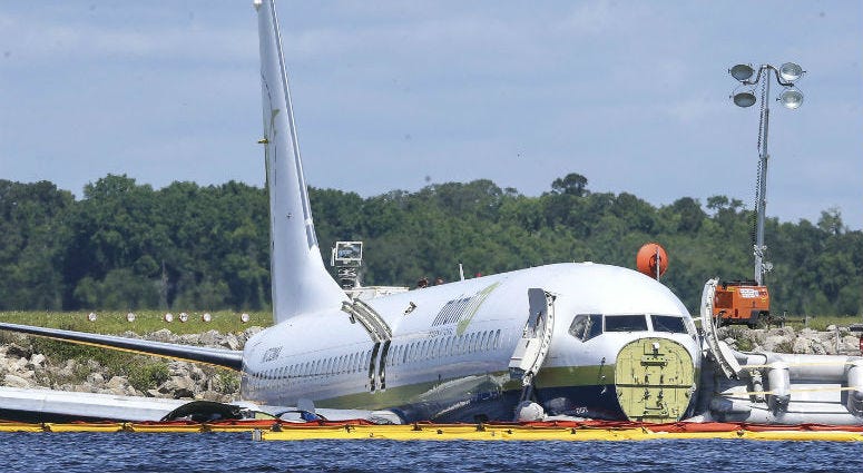 A charter plane carrying 143 people and traveling from Cuba to north Florida sits in a river at the end of a runway, Saturday, May 4, 2019 in Jacksonville, Fla. A charter plane carrying 143 people and traveling from Cuba to north Florida sits in a river at the end of a runway, Saturday, May 4, 2019 in Jacksonville, Fla.